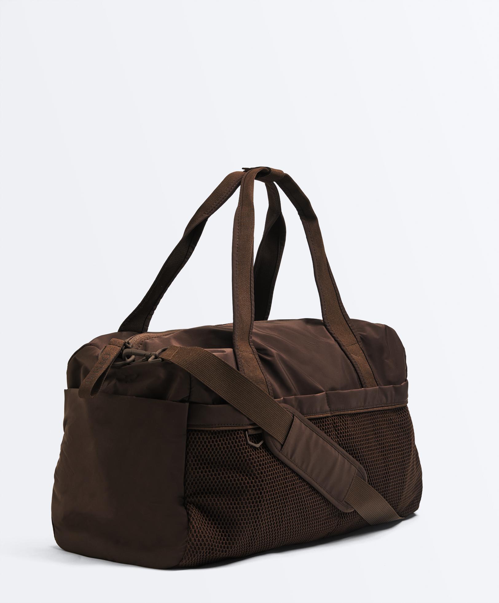 Technical bag with double compartment