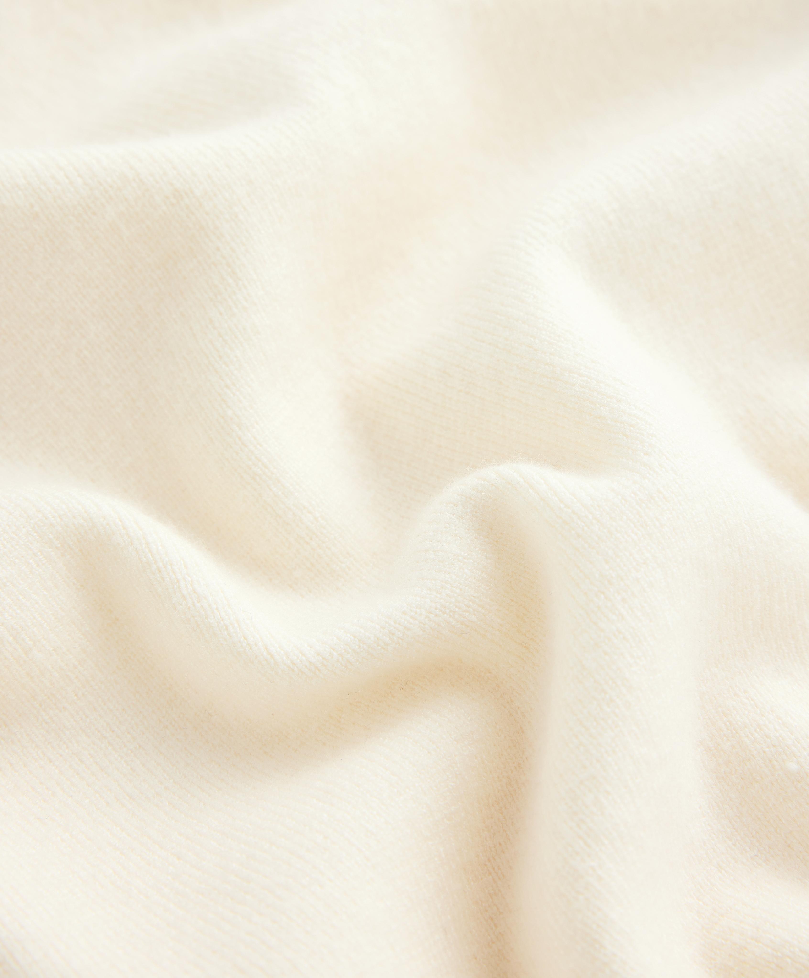 Veste en maille à manches contrastées Veste en maille à manches contrastées
