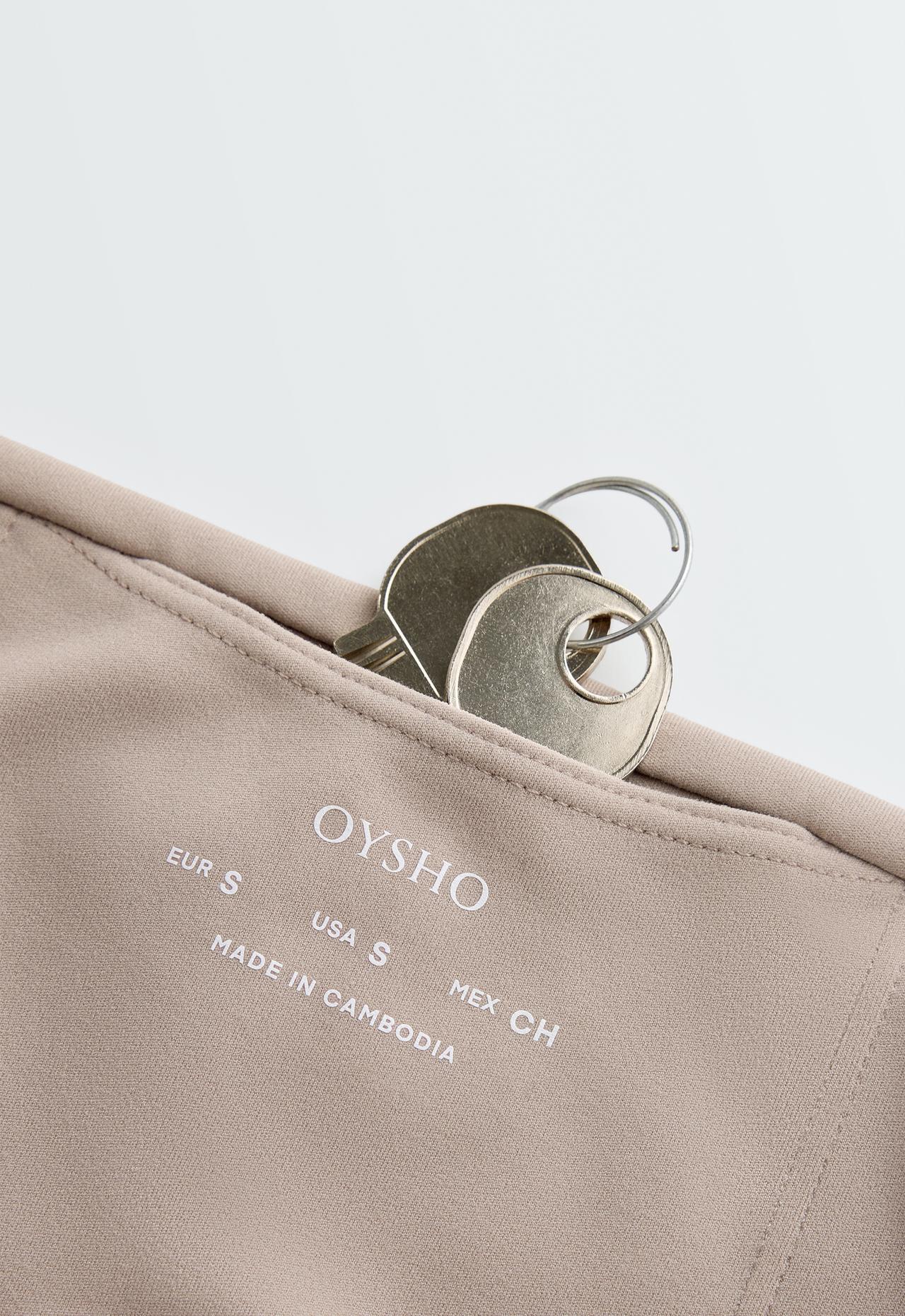 High-rise Comfortlux flare trousers — LIGHT STONE