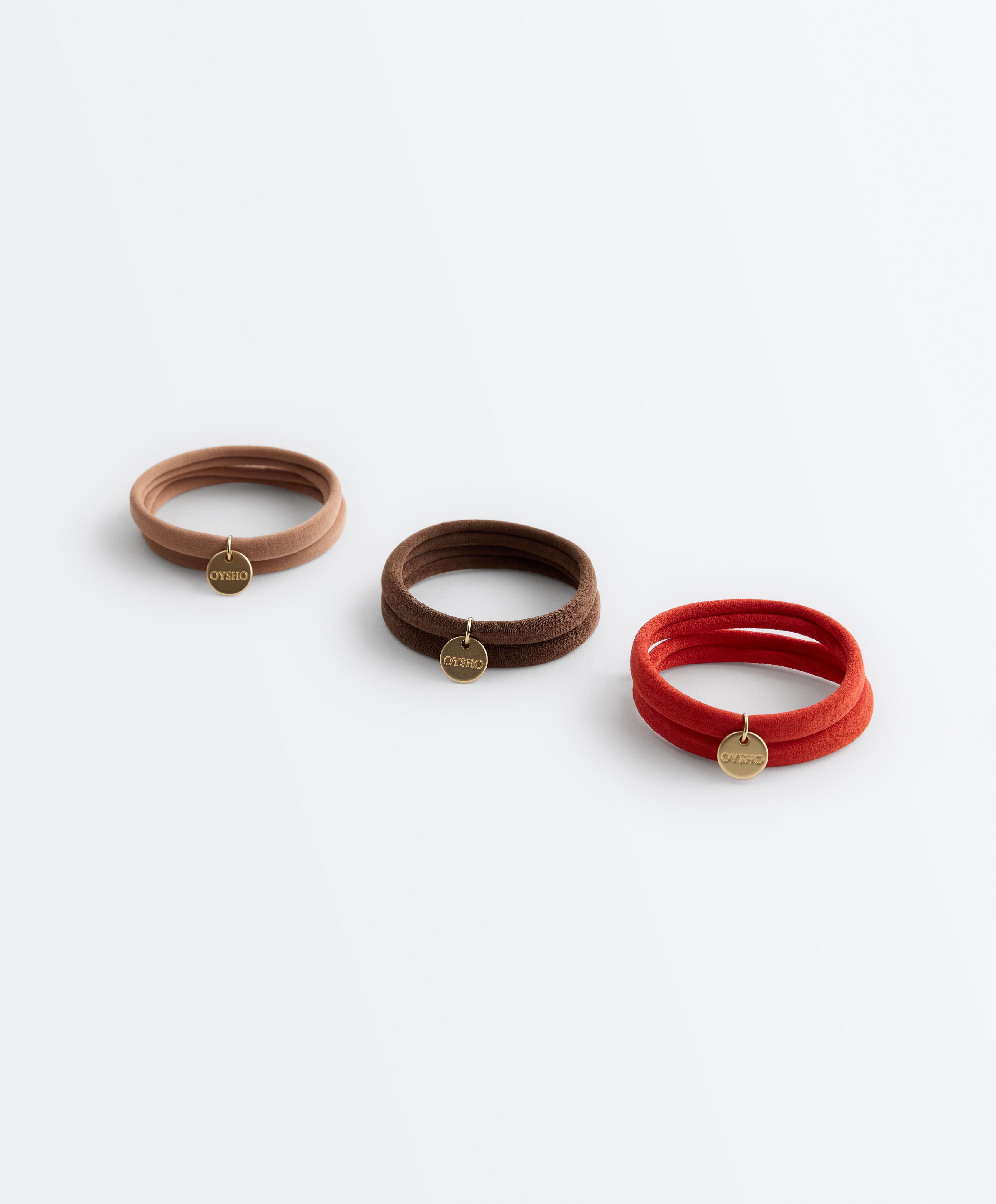 6 Oysho plaque hair ties