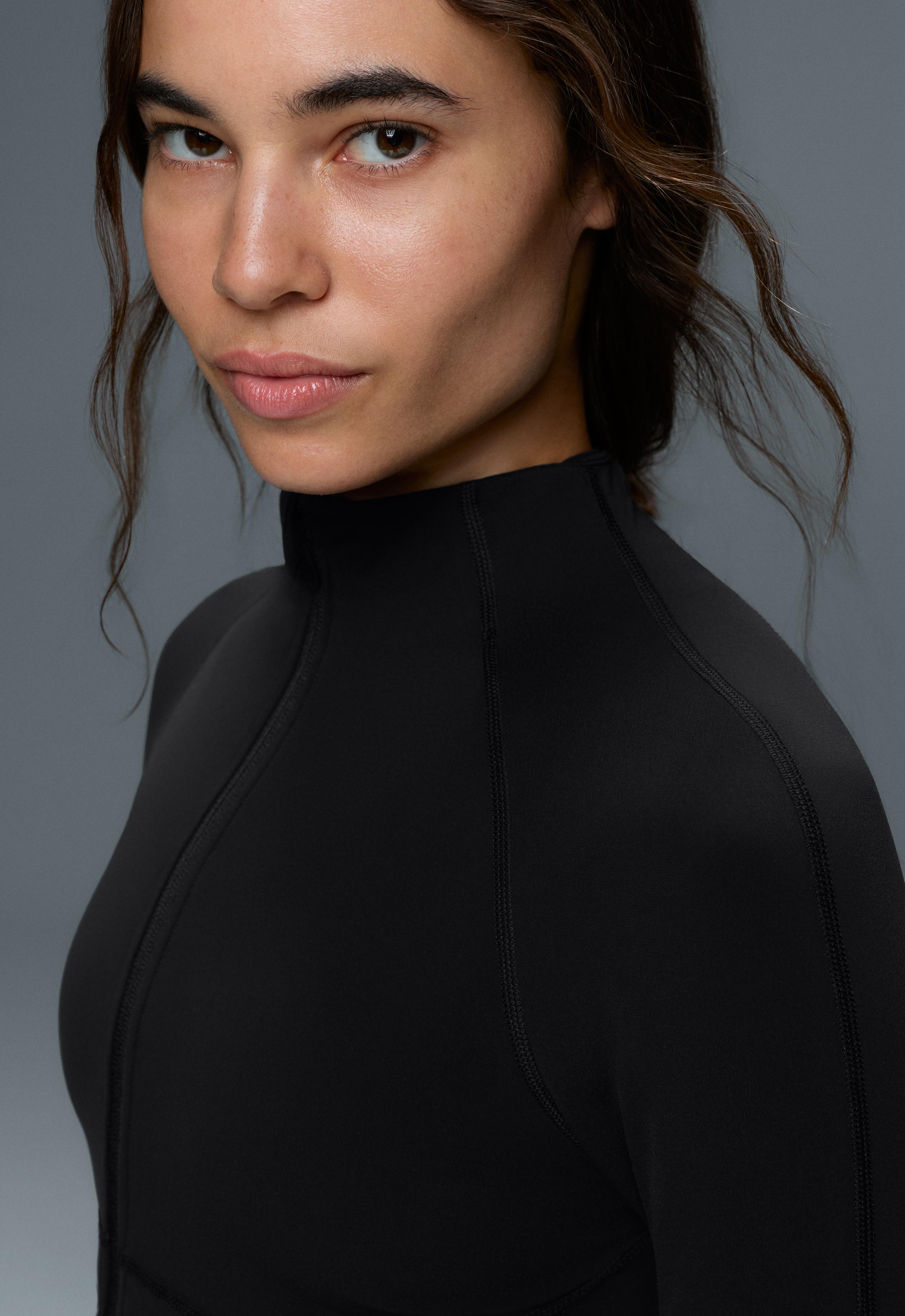 Light warm technical jacket with seams — BLACK