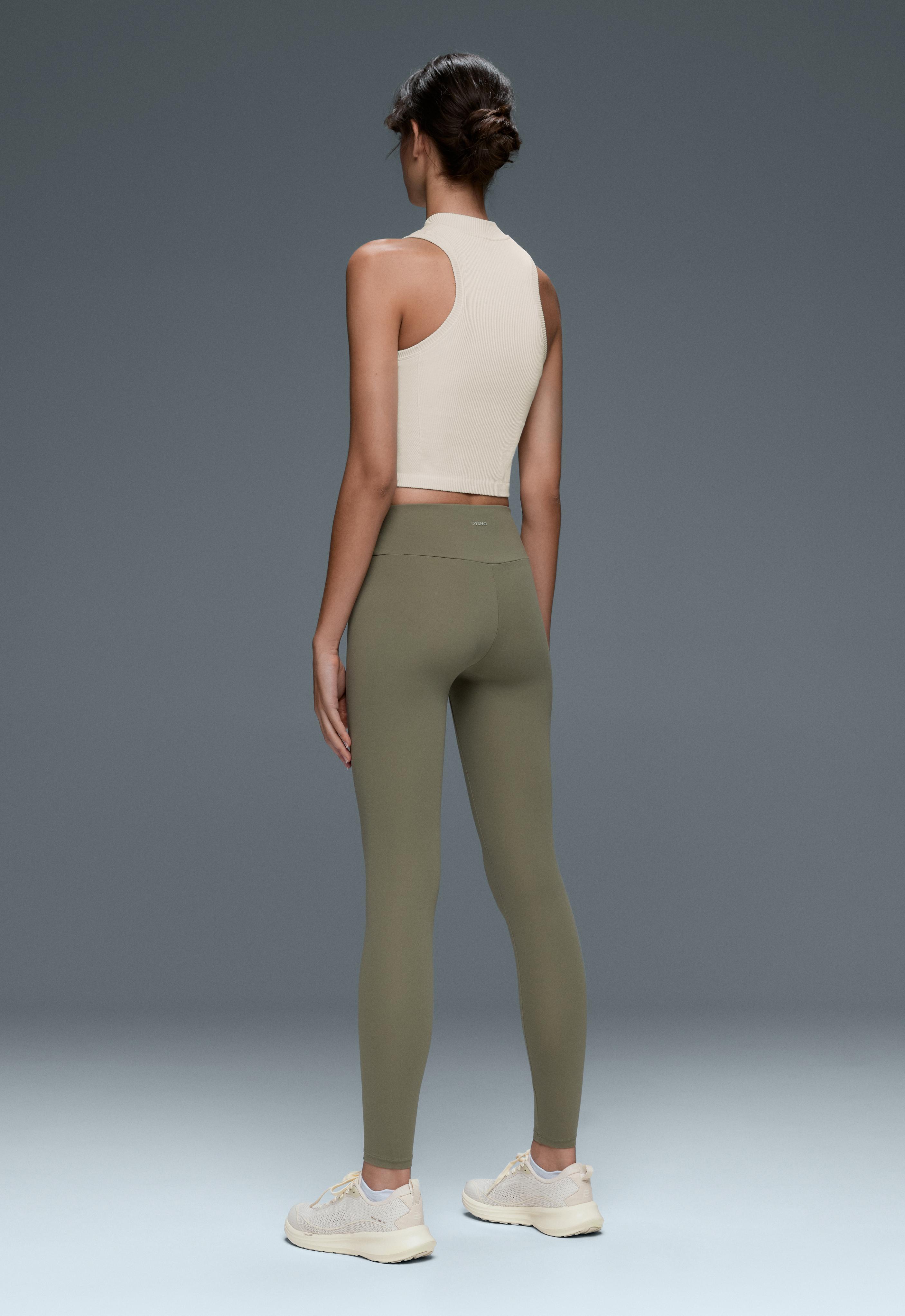 Sleeveless seamless rib tank top with half-zip — PALE ECRU