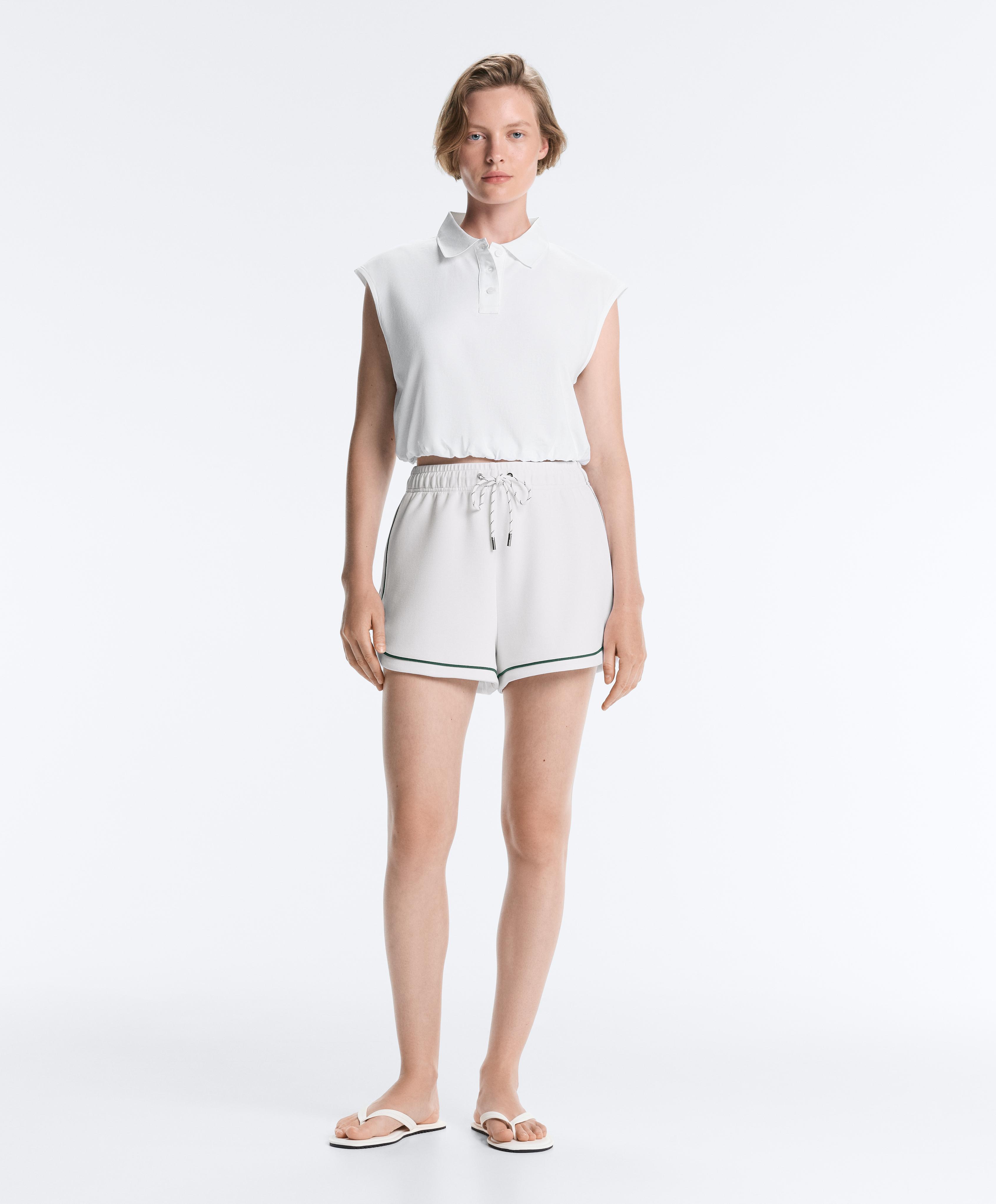Sleeveless piqué cotton polo shirt — WHITE