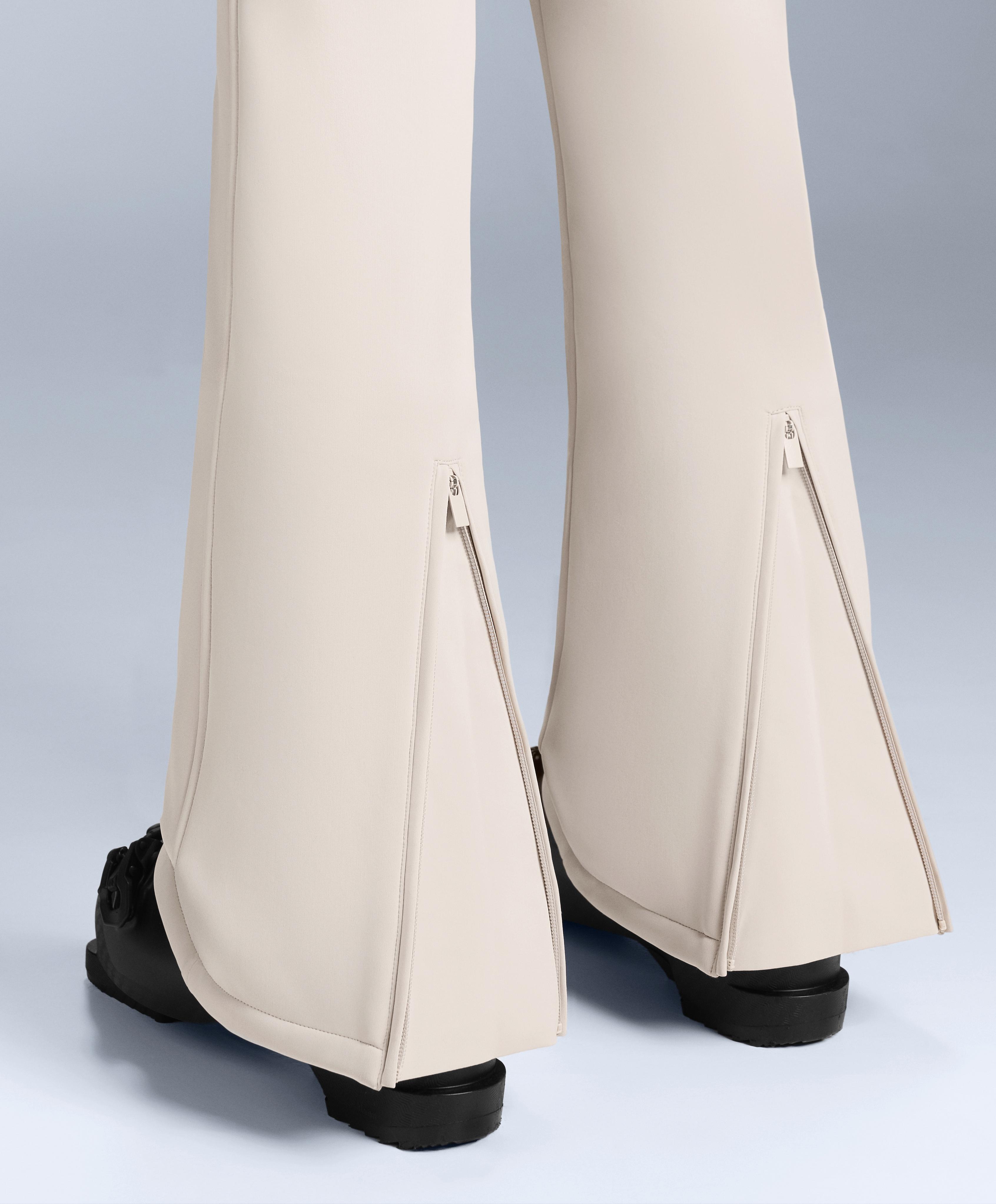 Water-resistant fitted stretch SKI jumpsuit — PALE MINK