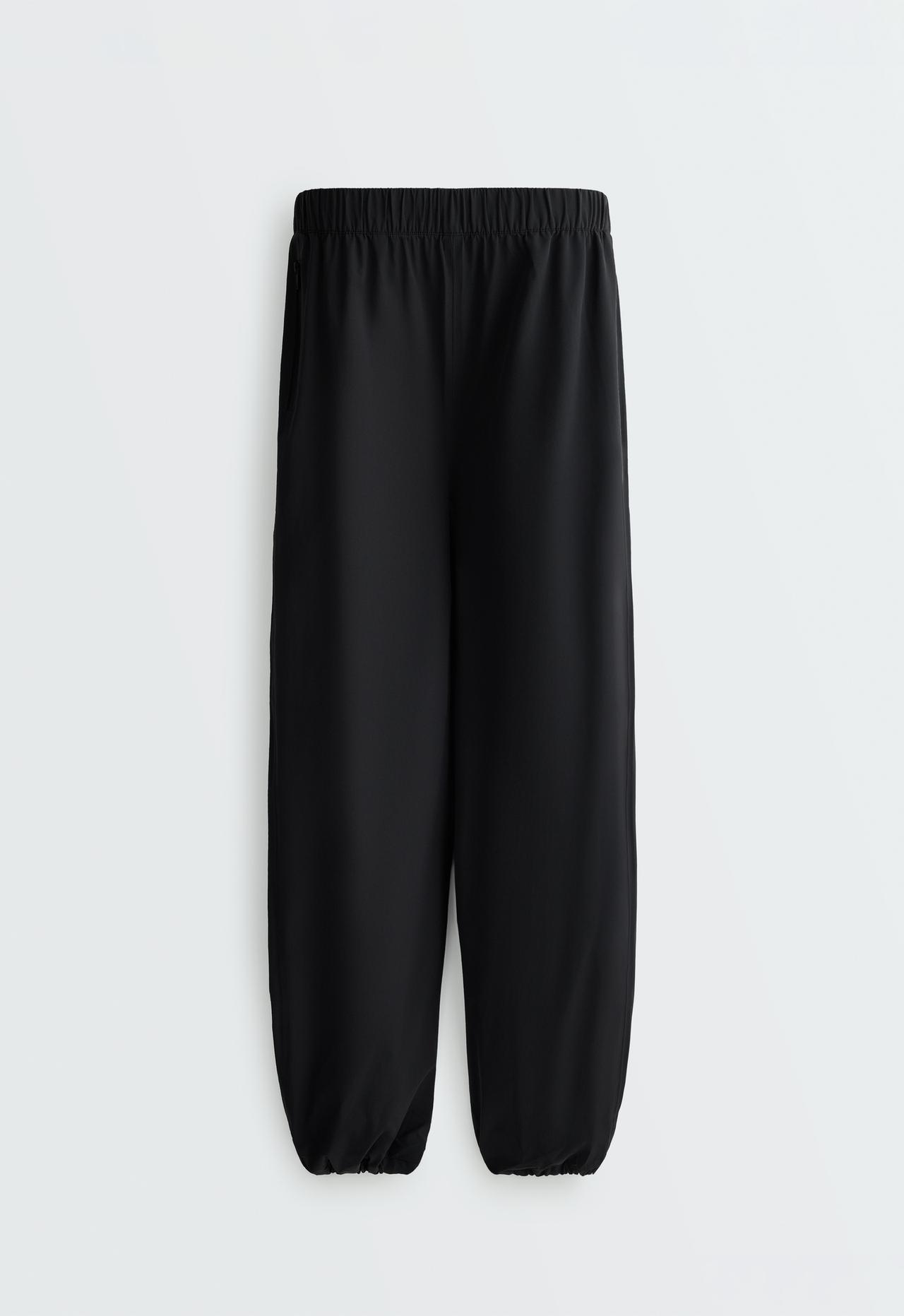 Waterproof 10k baggy trousers — BLACK