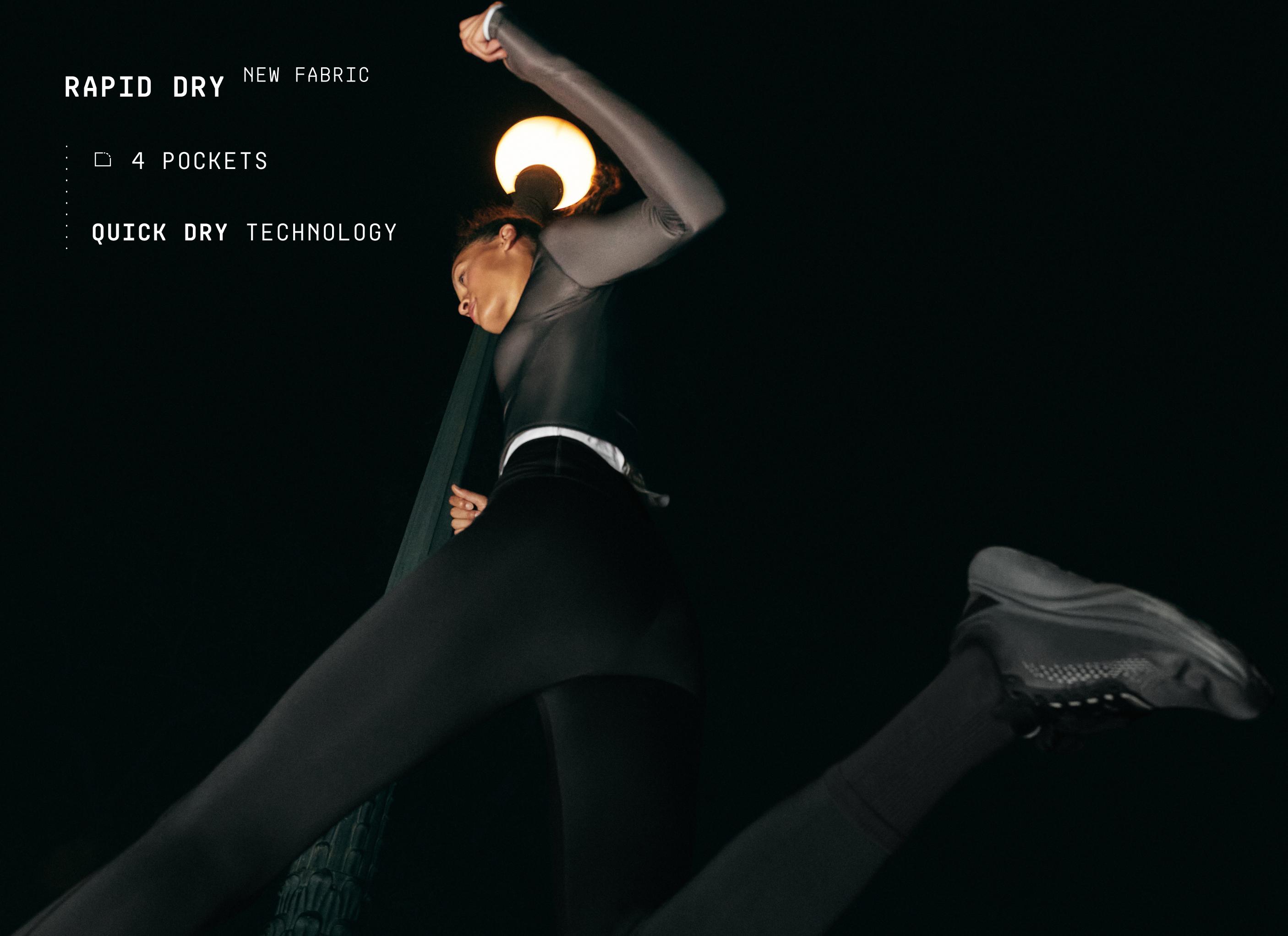 Set consisting of a long-sleeve top, black leggings, and black sneakers.