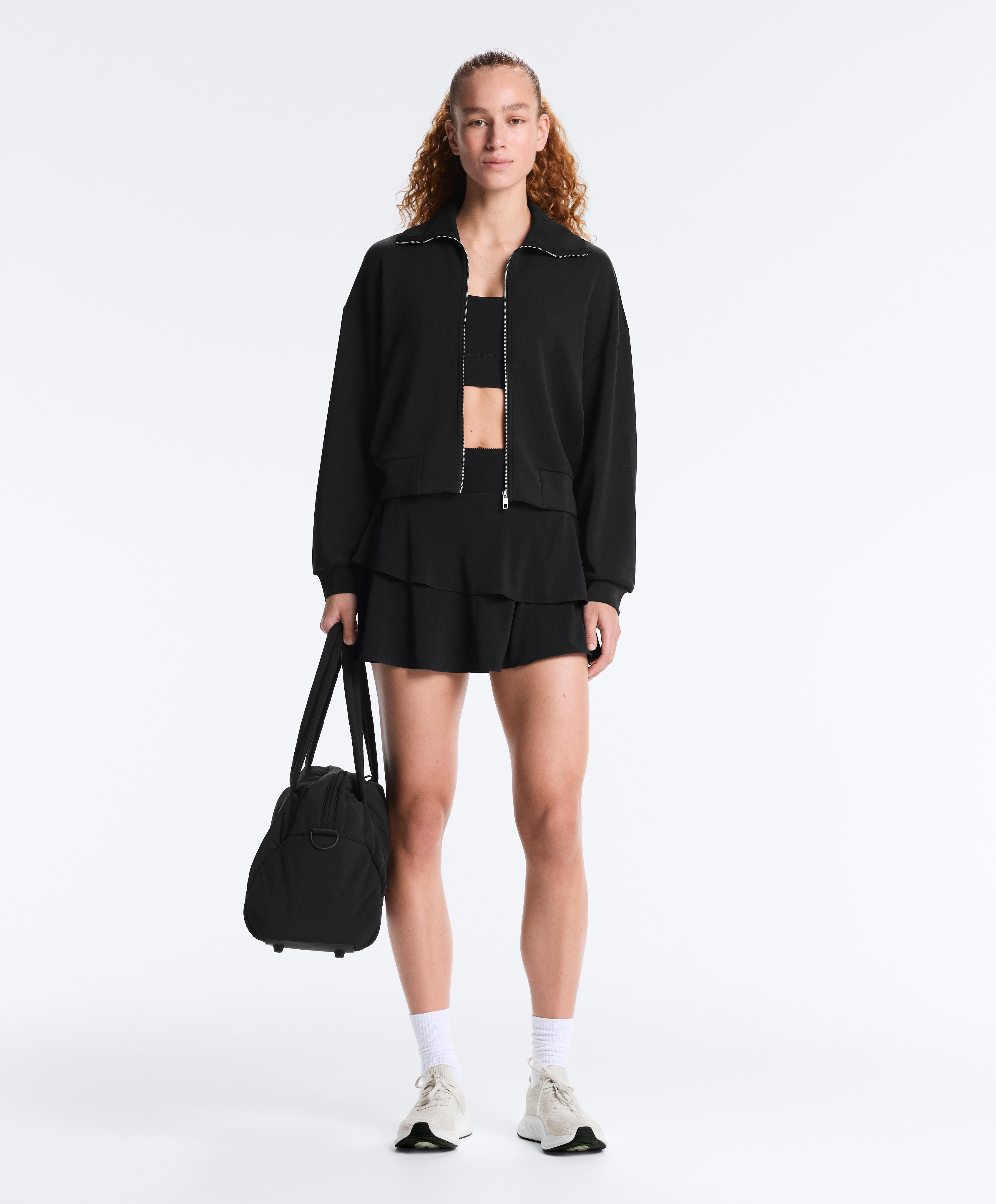 High-rise Compressive frill short skirt — BLACK