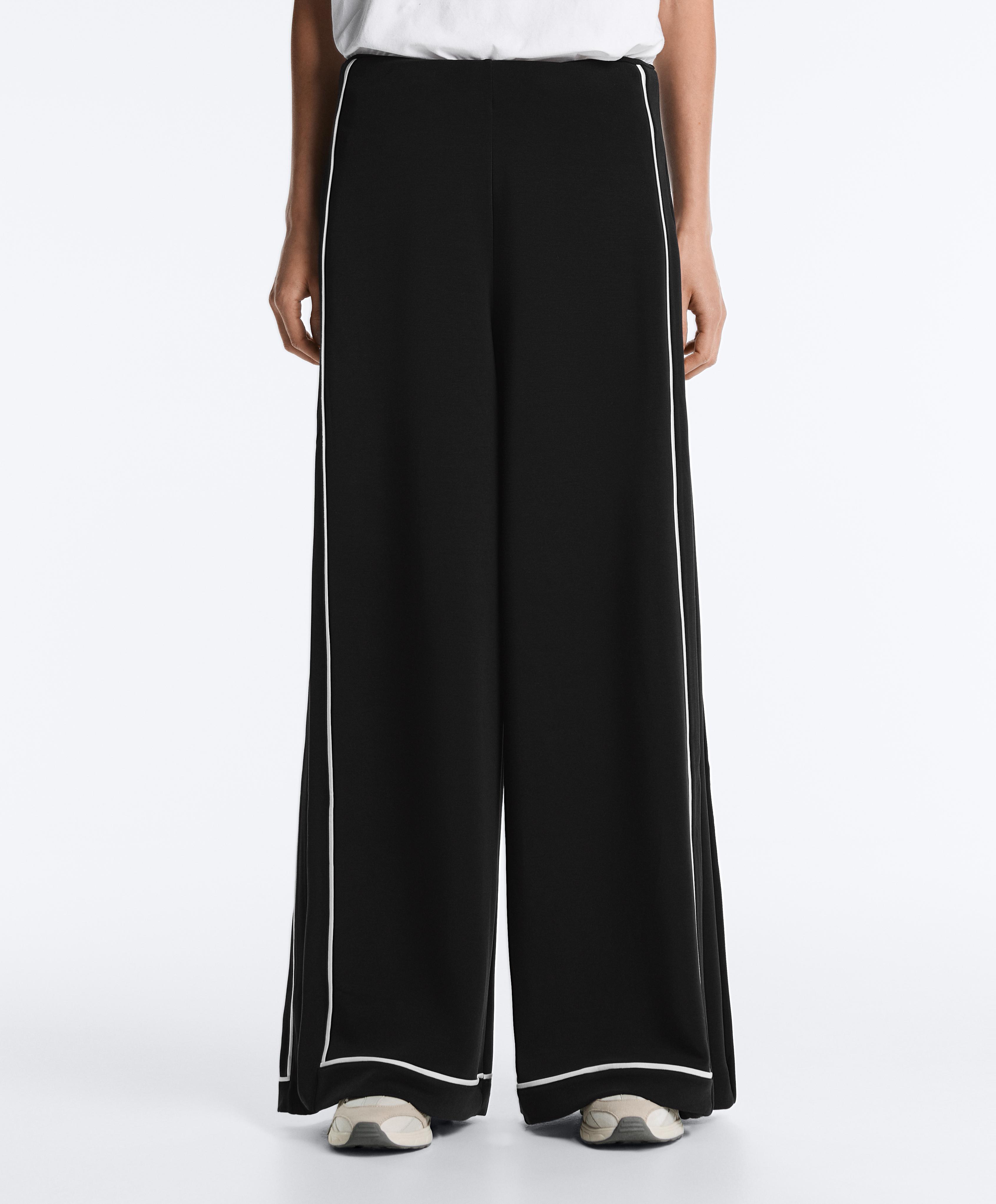 Soft-touch modal wide-leg trousers with contrast piping — BLACK