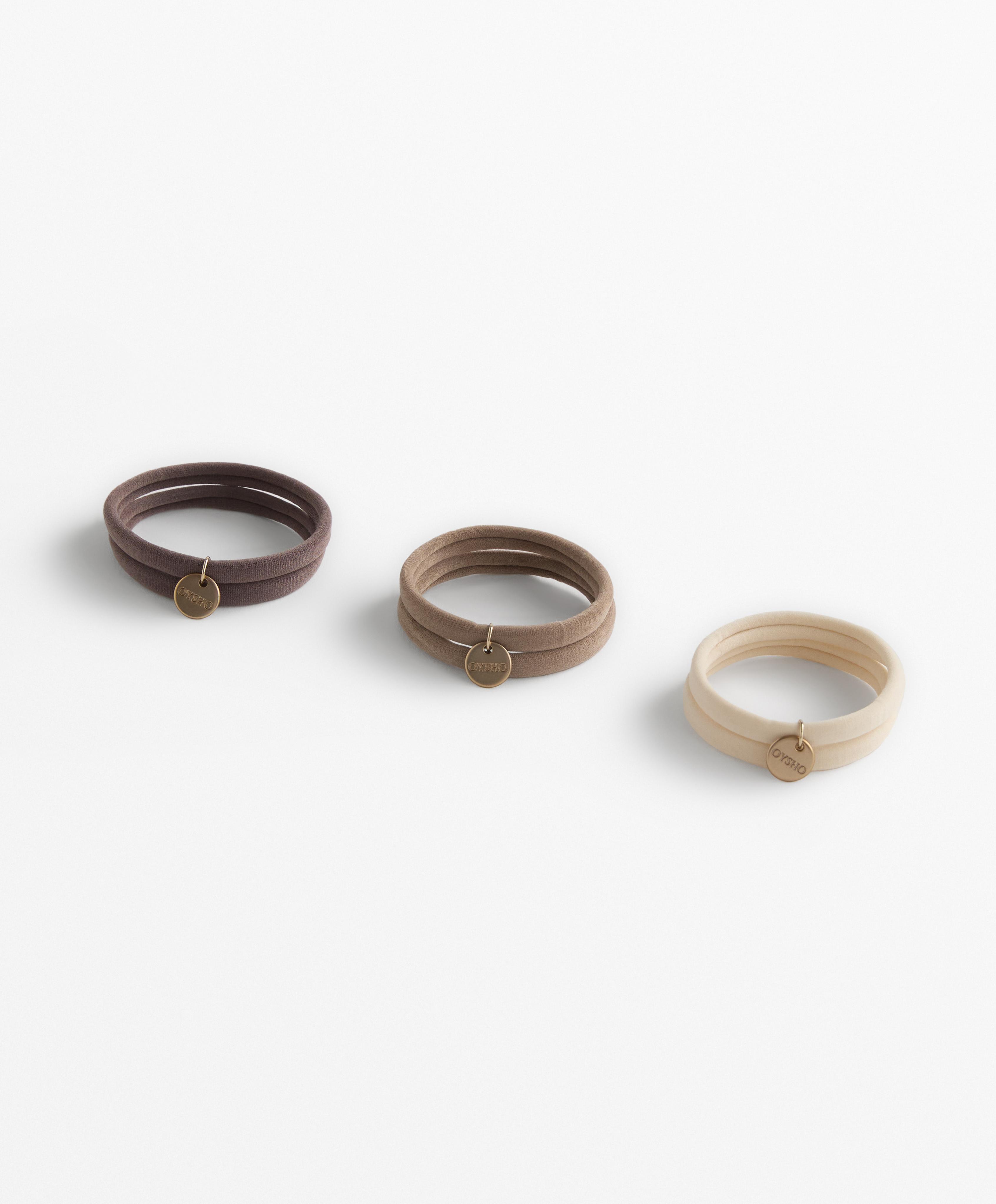 6 Oysho plaque hair ties