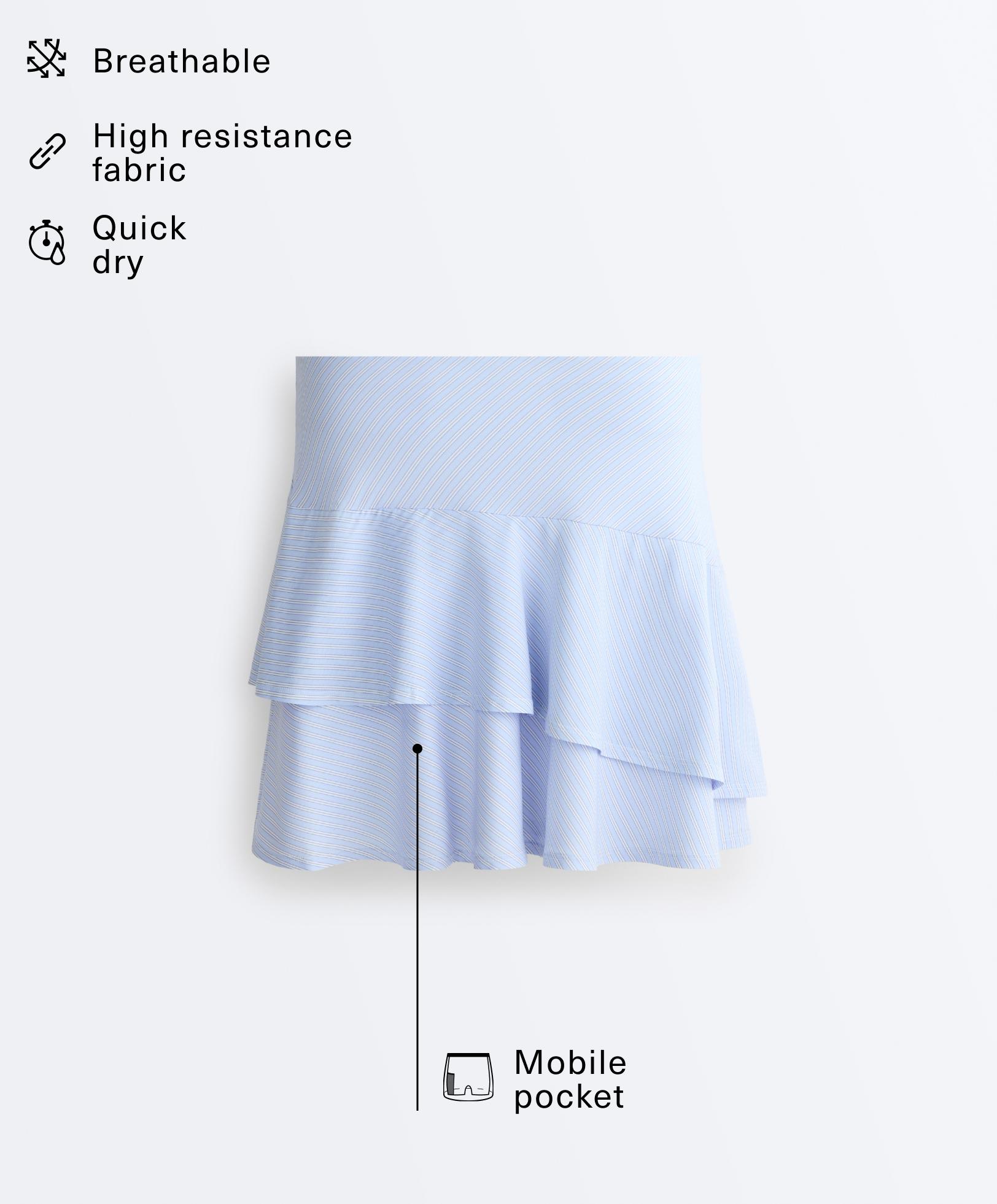 Short high rise skirt with striped ruffles — BLUE