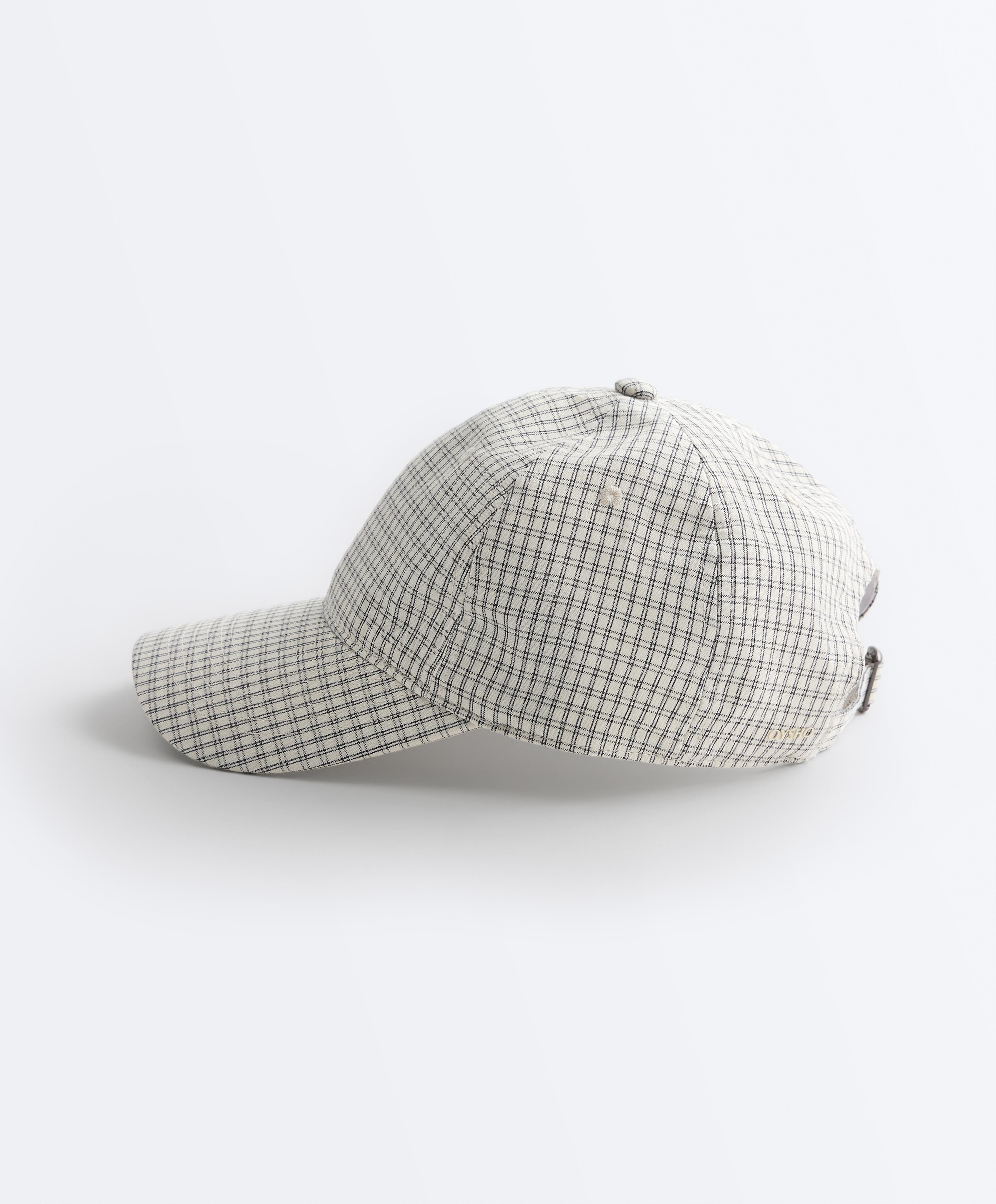 Check print cap — ECRU