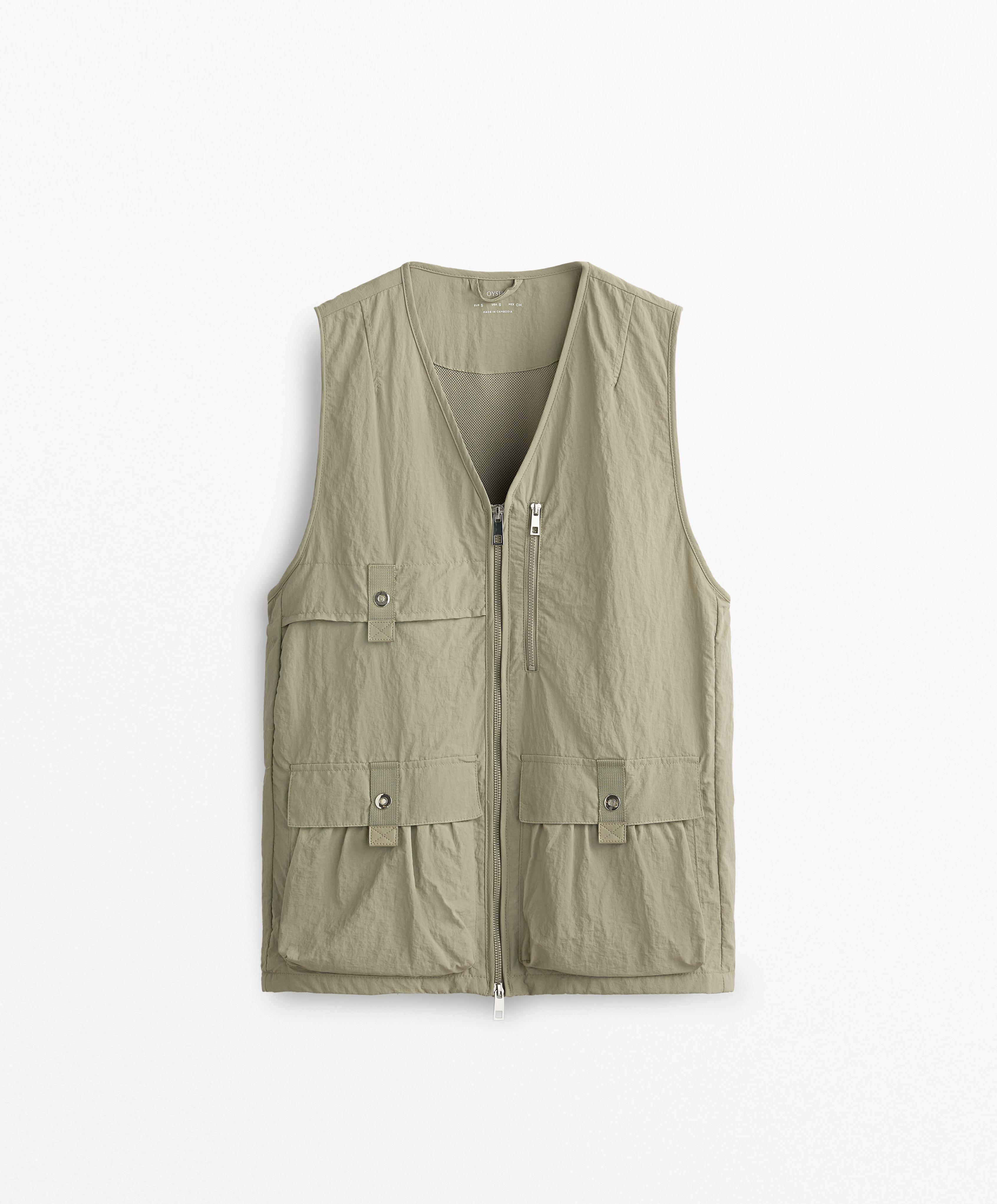Veste sans manches à poches hydrofuge Veste sans manches à poches hydrofuge