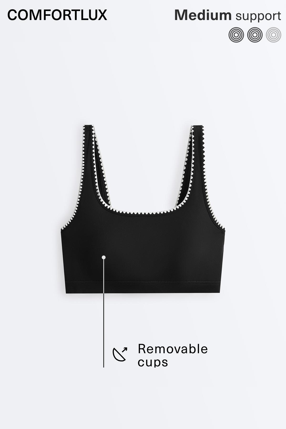 Medium-support Comfortlux sports bra with contrast seams — BLACK